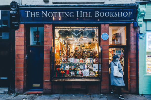 The Notting Hill Bookshop in London, United Kingdom The face view of The Notting Hill Bookshop in Portobello was used in the movie Notting Hill. Hugh Grant's bookshop was called "Travel Bookshop". notting hill photos stock pictures, royalty-free photos & images