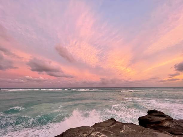 istock Pink skies in paradise as a storm approaches 1344588654