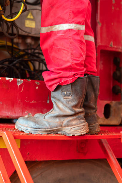 istock A worker is standing for working at height - industrial action photo. 1344588776