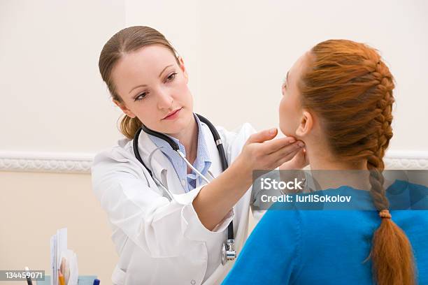 At Doctors Office Stock Photo - Download Image Now - Thyroid Gland, Medical Exam, Doctor