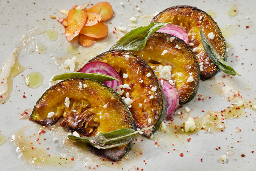 Roasted Kabocha Squash with Chioggia Beets, Goats Cheese and a Brown Butter and Sage Vinaigrette