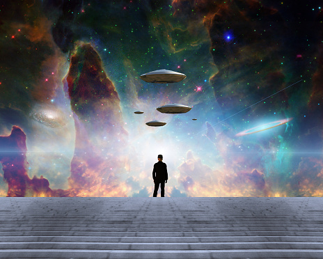 Man in black suit and flying saucers. 3D rendering