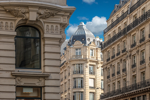 Distinctive Parisian flats located on Rue Réaumur in Paris, France. The Rue Réaumur (2nd and 3rd arrondissements) was built in 1895 and is a fabulous example of early 20th century architecture, a symbol of the new urbanism imagined by the architects of the time.