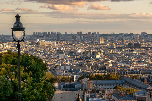 View of Paris and the centre of Paris at sunset, as seen from the steps at Sacré Coeur, Montmartre, Paris