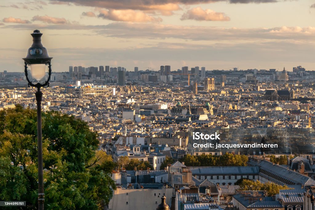 View of Paris and the centre of Paris at sunset, as seen from the steps at Sacré Coeur, Montmartre, Paris Pompidou Center Stock Photo