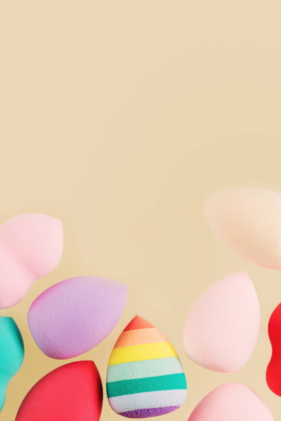 istock Colorful cosmetic beauty sponges different form Red, pink, rainbow colored makeup tools 1344598954