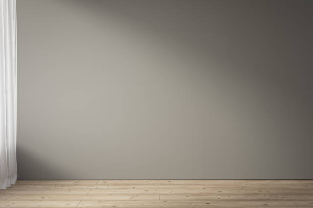 istock Blank gray wall and wood floor . 1344601911
