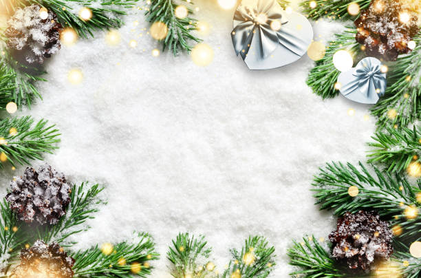 istock Christmas background, green pine branches, gift box on snow background and light. Creative composition, top view. New Year's, holiday, christmas, decoration. 1344602045
