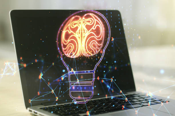 istock Creative idea concept with light bulb and human brain illustration on modern laptop background. Neural networks and machine learning concept. Multiexposure 1344606103