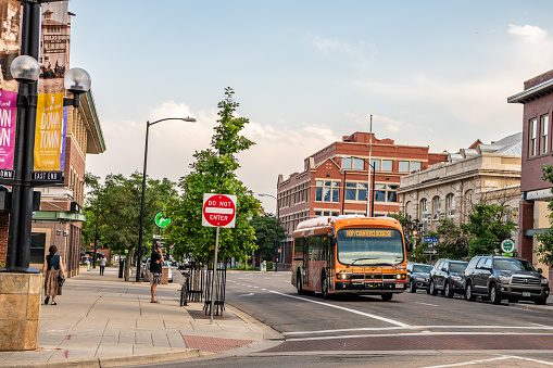 Boulder, CO - August 28, 2021: A bus downtown, near the famous Pearl Street Mall.