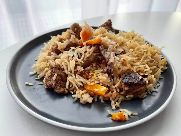 istock pilaf with meat in a plate 1344608755