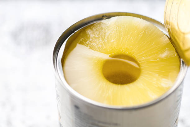 istock Open tin of canned pineapple 1344610444