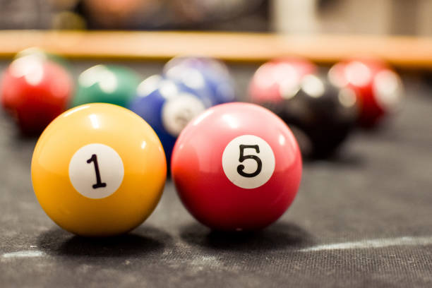 istock Pool balls showing number 15 15th birthday game copy space 1344611787
