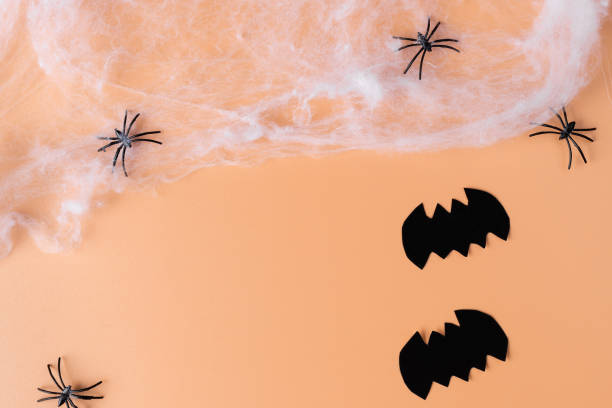 istock Halloween decorations on orange color background 1344615558