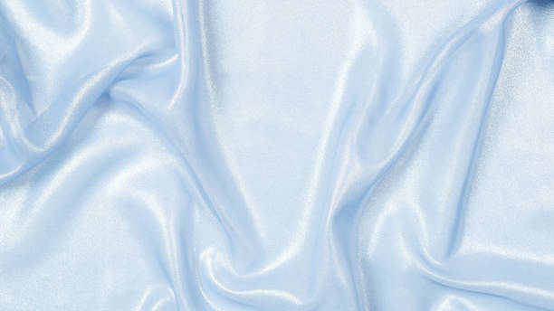 istock Blue shiny pearl fabric as a background. 1344622582