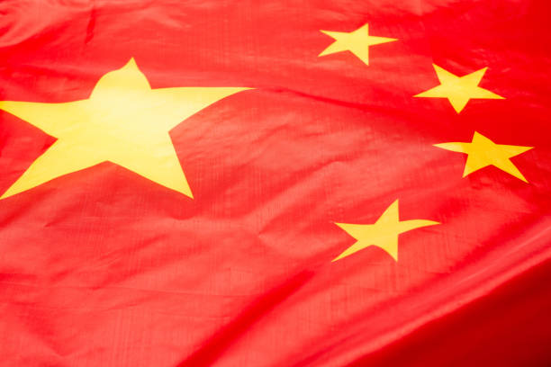 istock China flag waving as a background. 1344622593