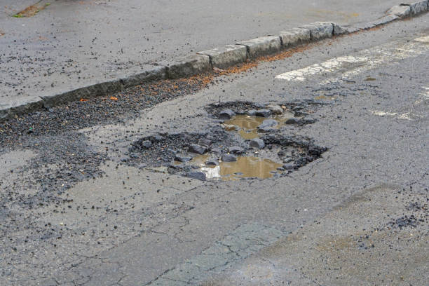 istock Pothole water street 1344624243