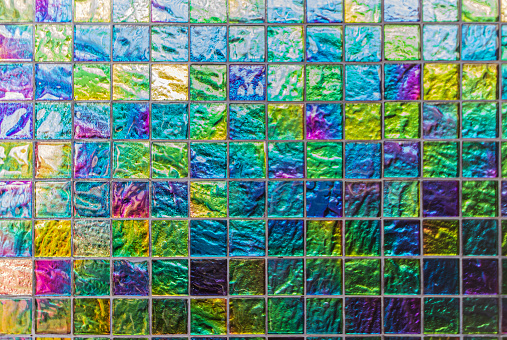Background of colorful glazed tiles on a wall
