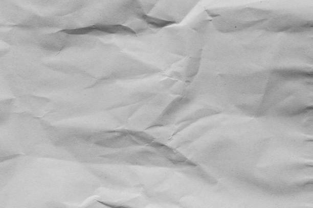 istock crumpled gray color paper background texture for design concept 1344632833