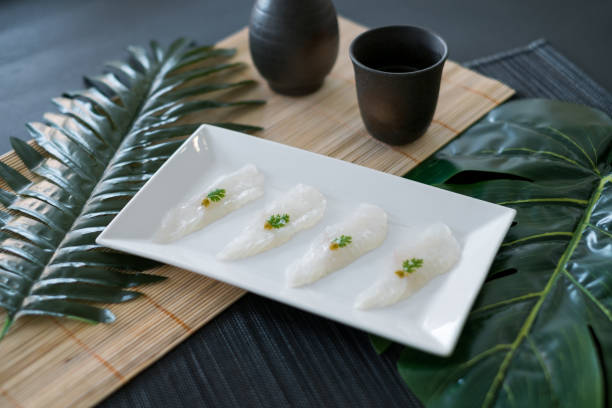 istock Sashimi on white plate in Japanese restaurant. 1344637528