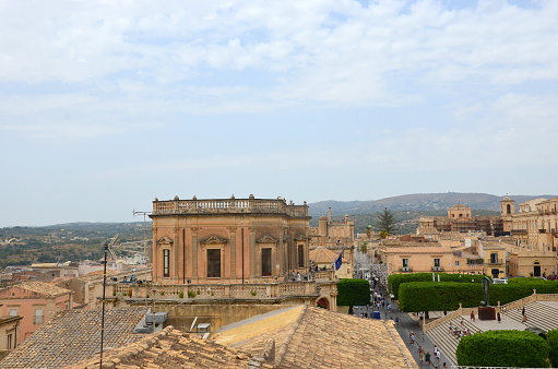 Aerial view of the beautiful baroque city of Noto, in the south of Sicily, taken on a cloudy day during a trip to Sicily in the summer of 2021.
