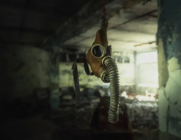 Gas mask hanging in an abandoned building - Pripyat, Chernobyl Exclusion Zone, Ukraine