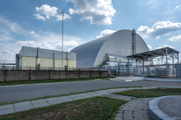 New Safe Confinement (Sarcophagus) at Reactor 4 of Chernobyl Nuclear Power Plant - the place of 1986 disaster - Chernobyl Exclusion Zone, Ukraine New Safe Confinement (Sarcophagus) at Reactor 4 of Chernobyl Nuclear Power Plant - the place of 1986 disaster - Chernobyl Exclusion Zone, Ukraine chornobyl photos stock pictures, royalty-free photos & images
