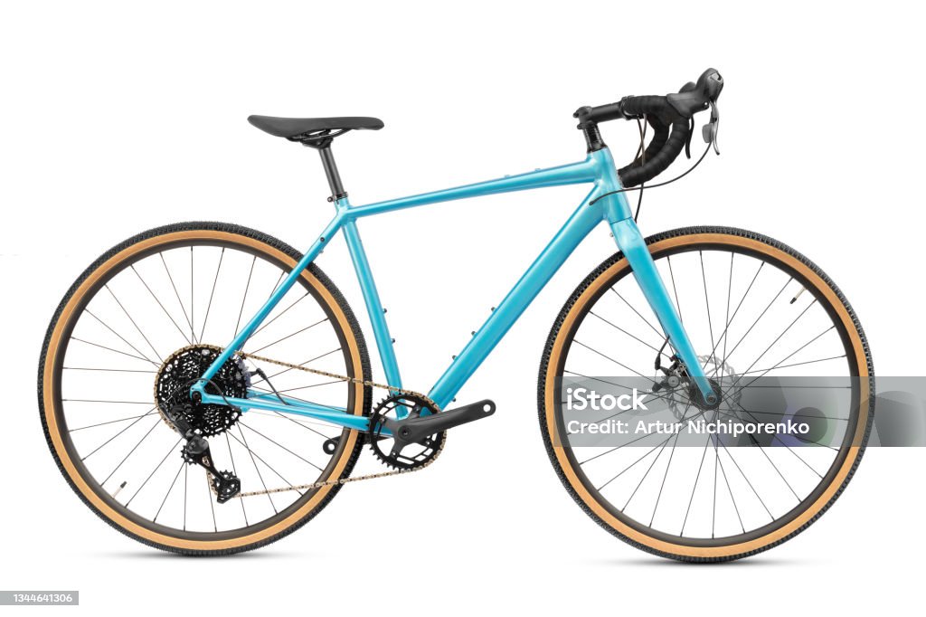 Professional gravel bike or road bike isolated on white background. New professional gravel bike or road bike with blue frame isolated on white background. Active sport and recreation. Bicycle Stock Photo