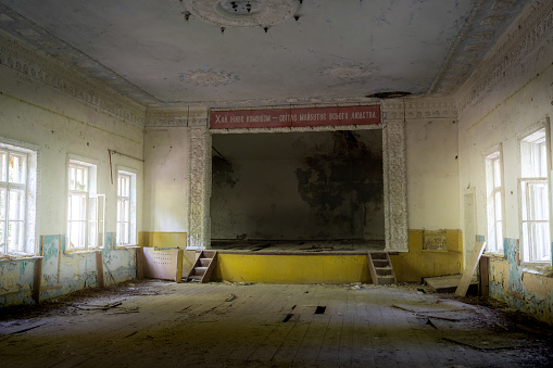 Chernobyl, Ukraine - Aug 06, 2019: Palace of Culture - Text says: Long live communism - the bright future of all humanity - Zalissya Village, Chernobyl Exclusion Zone, Ukraine