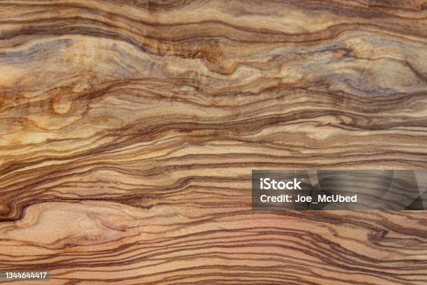 Olive Tree Wood Background With Brown Betas Stock Photo - Download Image Now - Wood - Material, Sustainable Resources, Olive - Fruit