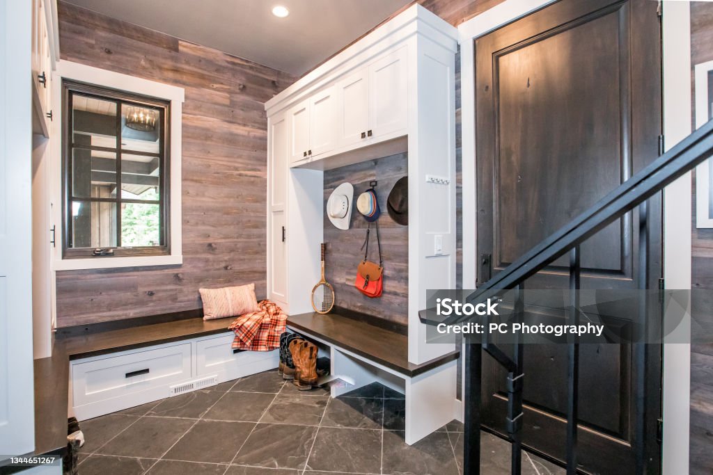 Amazing mudroom with space for plenty of items Nook for entering and exiting the house Tiled Floor Stock Photo