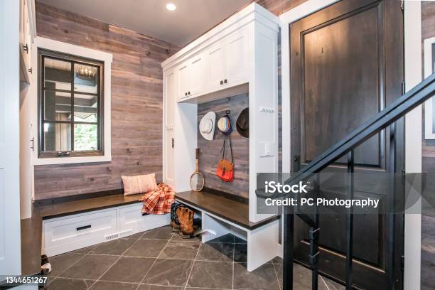 Amazing Mudroom With Space For Plenty Of Items Stock Photo - Download Image Now - Tiled Floor, Mudroom, Home Interior