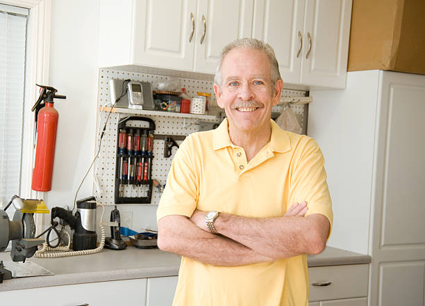 Man Inside His Garage stock photo