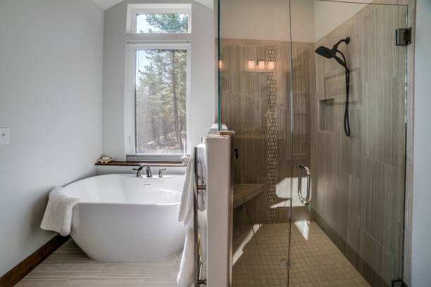 istock Shower and free standing bathtub in bathroom 1344658954