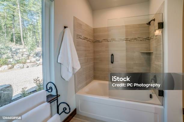 Half Glass On Tub Shower Combo Stock Photo - Download Image Now - Bathtub, Shower, Bathroom