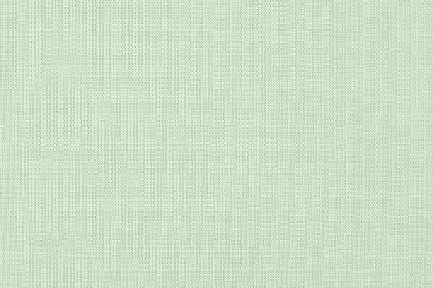 istock Silk fabric texture pattern background in light pale blue mint lime green teal color tone 1344661683