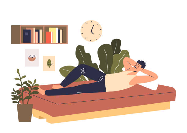istock Man sleeping on coach. Male cartoon character daydreaming or napping in bedroom 1344663053