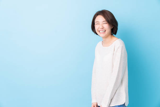 istock attractive asian woman relaxing 1344666233