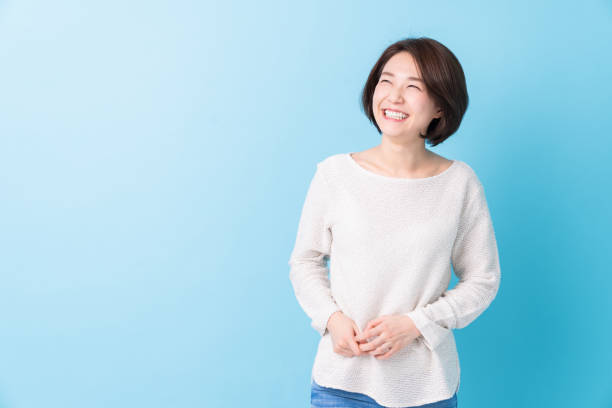 istock attractive asian woman relaxing 1344666411