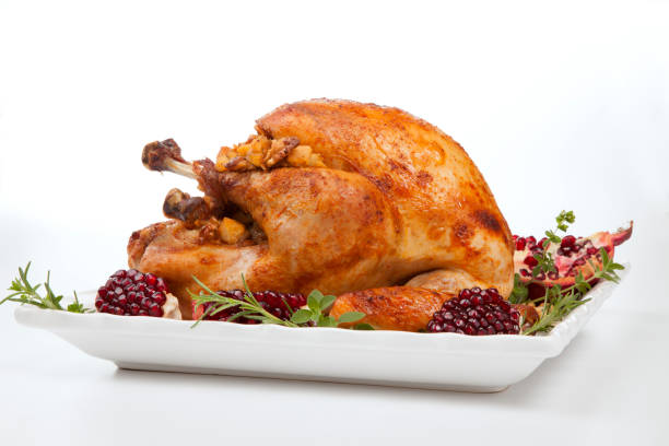 istock Pomegranate Glazed Roasted Turkey on White 1344667730