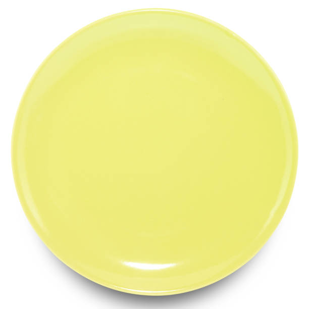 istock Green circle ceramics plate isolated on white background. 1344674775