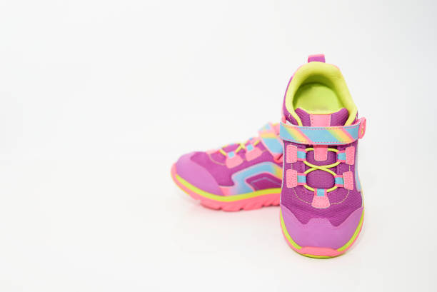 istock color kid  sneakers shoes on floor front view soft focus 1344678209