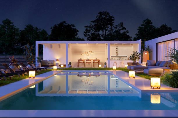 luxusvilla außen in der nacht mit pool, sofa und liegestühlen. - house residential structure luxury night stock-fotos und bilder