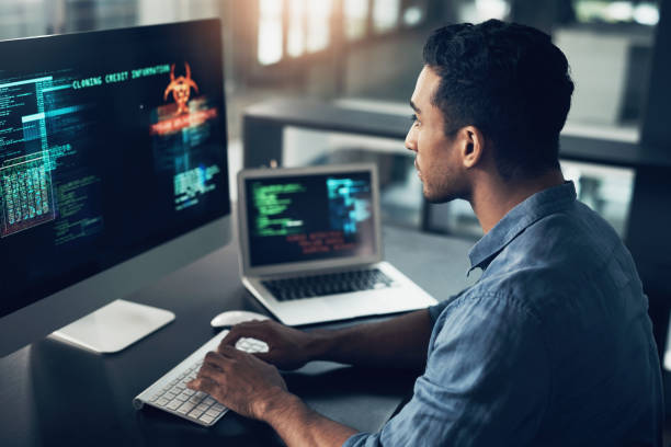 istock Shot of a man using a computer in a modern office 1344688302