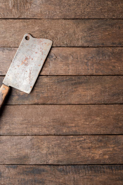 istock Butcher knife - cleaver. Food background 1344693667