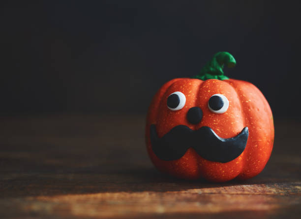 Halloween Background of Pumpkin with Handmade Face