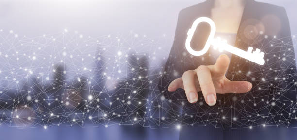 istock Safety and security concept. Hand touch digital screen hologram key sign on city light blurred background. Network is the key to success. 1344694939
