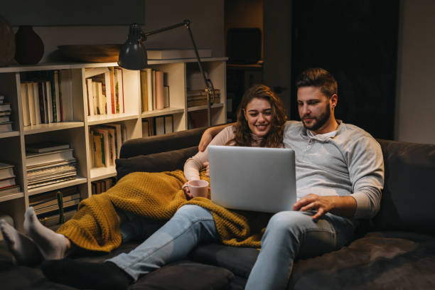 istock friends enjoying time at home 1344699360