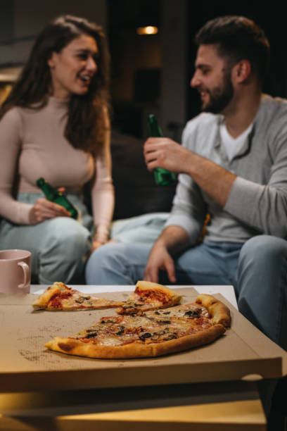 istock friends enjoying time at home 1344699411
