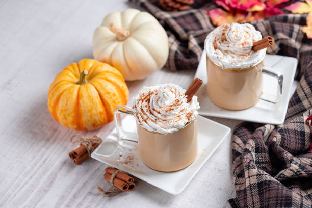 istock Pumpkin latte, hot caffee drink with pumpkins, whipped cream and spices 1344700367